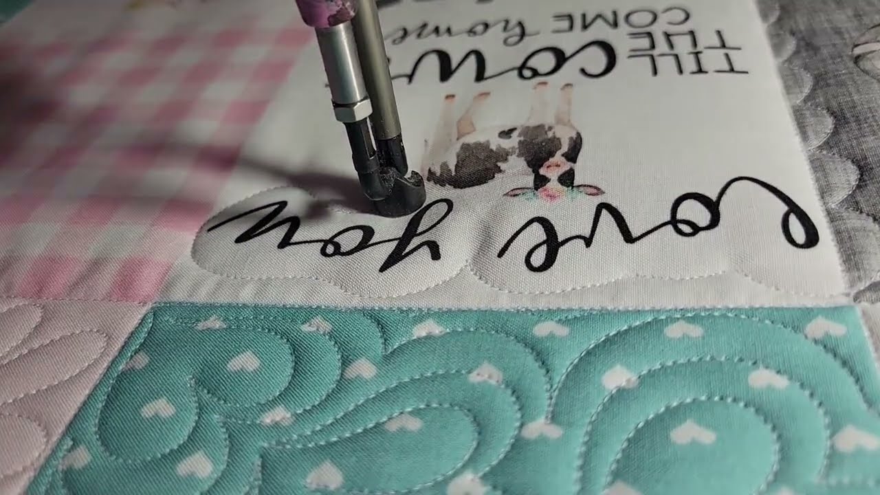 Quilting a fabric panel... Cute cows, hearts, flowers, tractors, words free motion longarm quilting