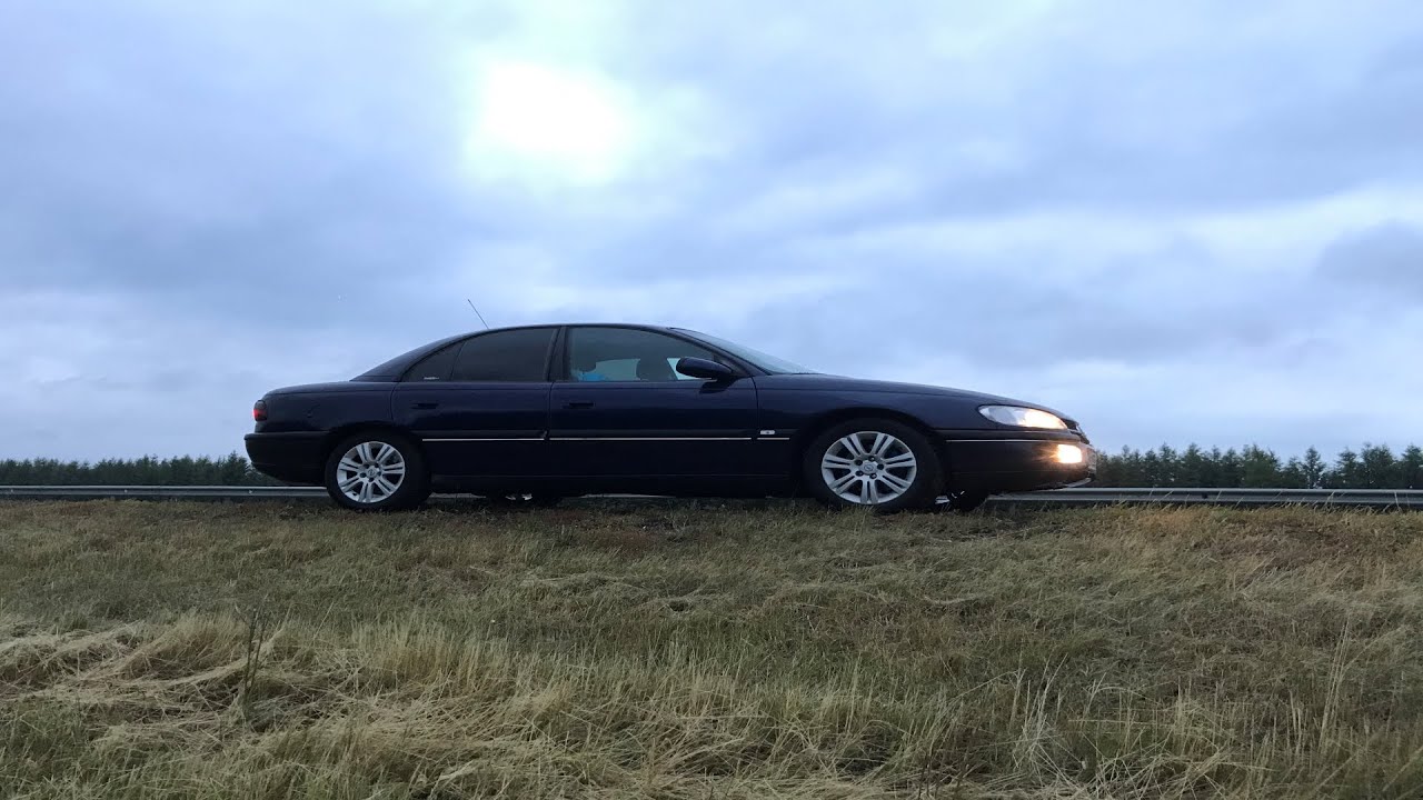 Замена моторчика центрального замка Opel Omega B.