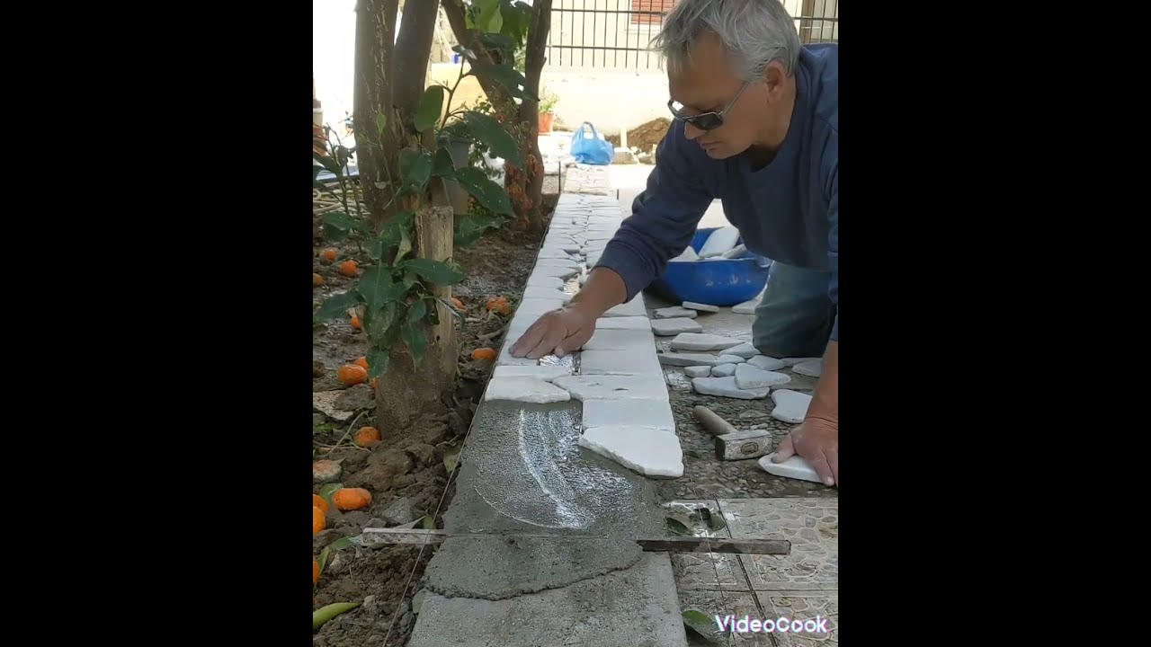 τοποθέτηση υδροαμμοβολισμένων  ακανόνιστων ρεταλιών μαρμάρων....