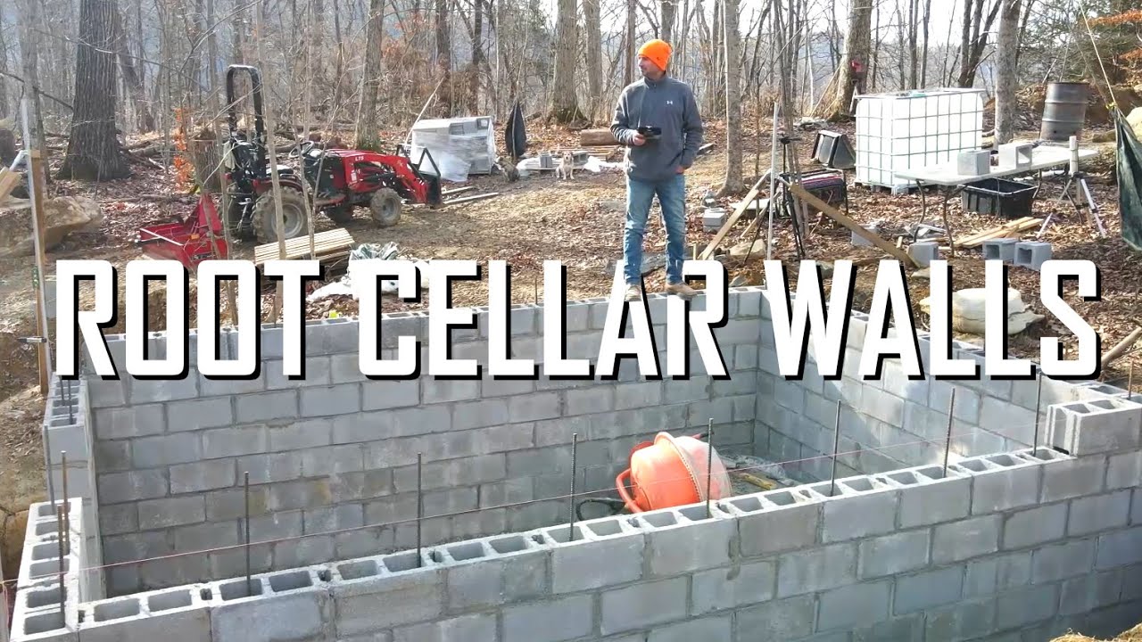 Building the root cellar walls with concrete block // E135
