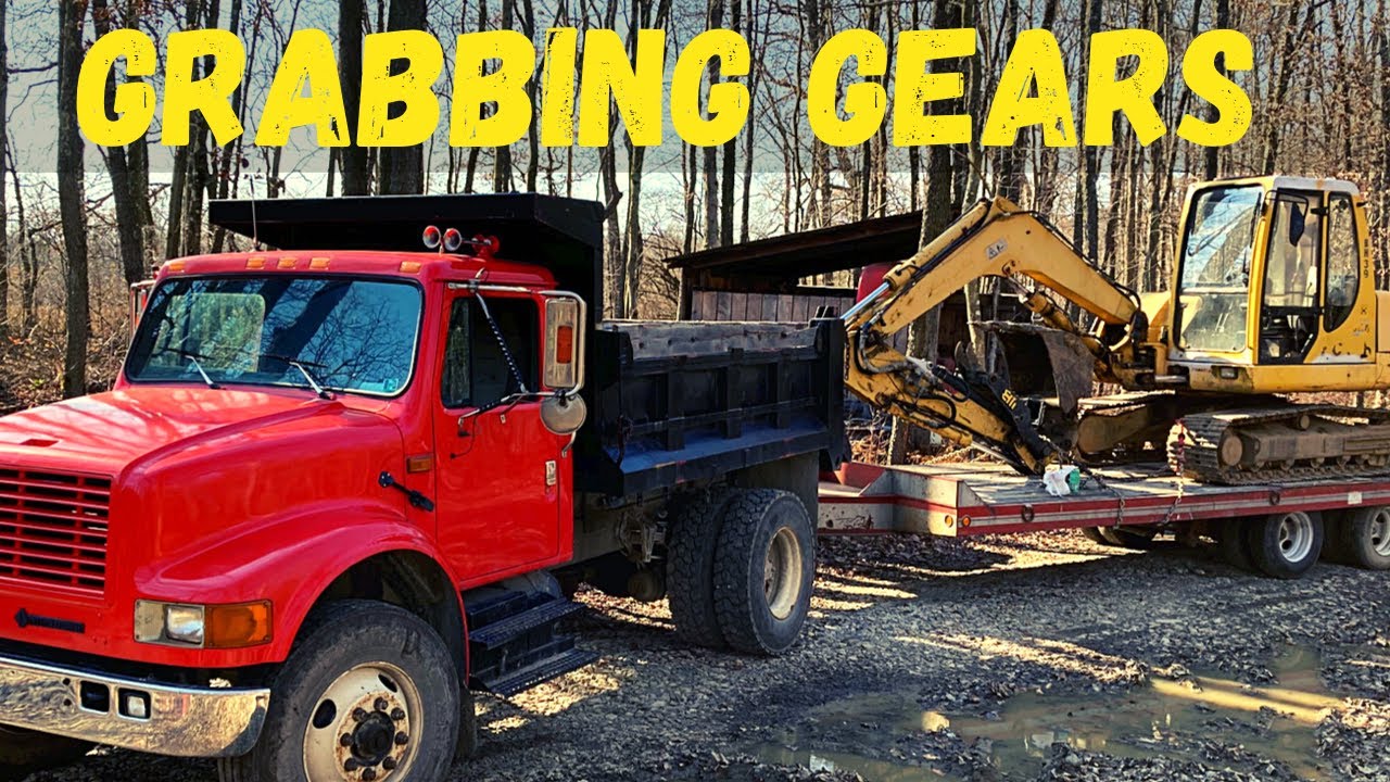 Hauling a Dirty old TrackHoe