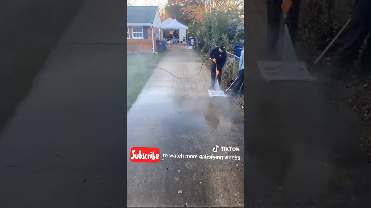 Pressure washing driveway with a stencil