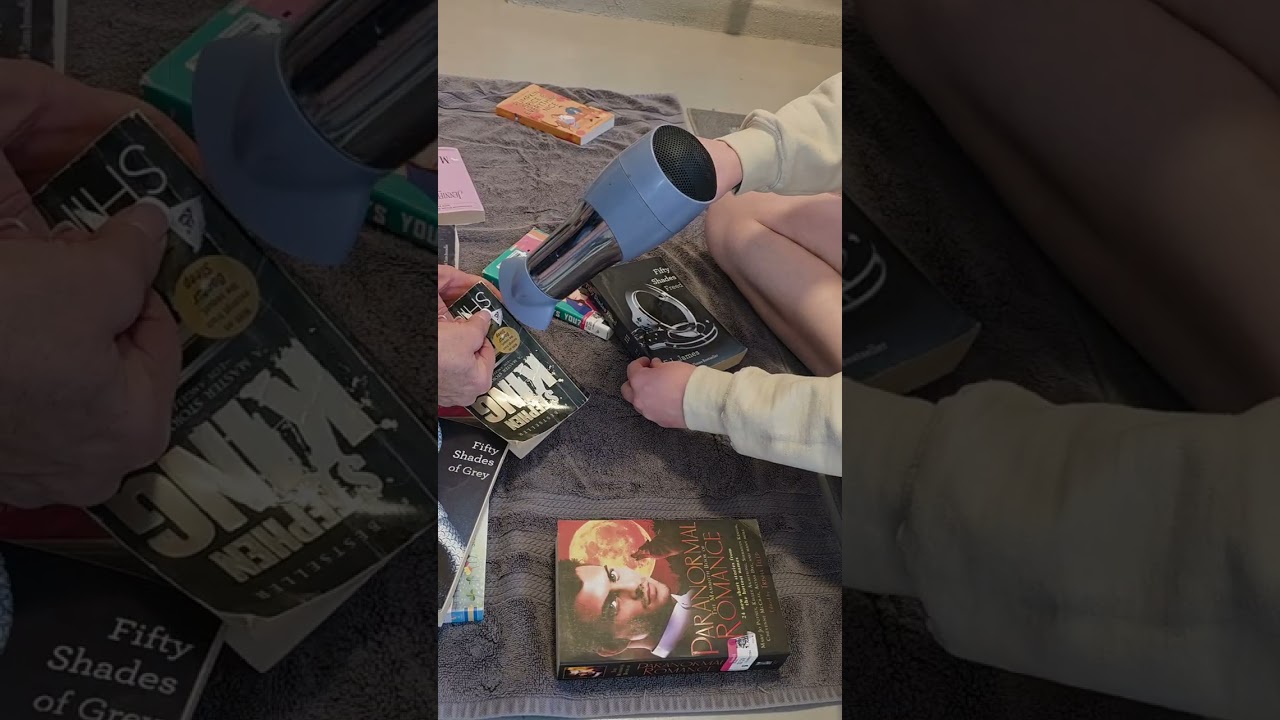 Watch us easily remove price stickers on used books  with a blow dryer!