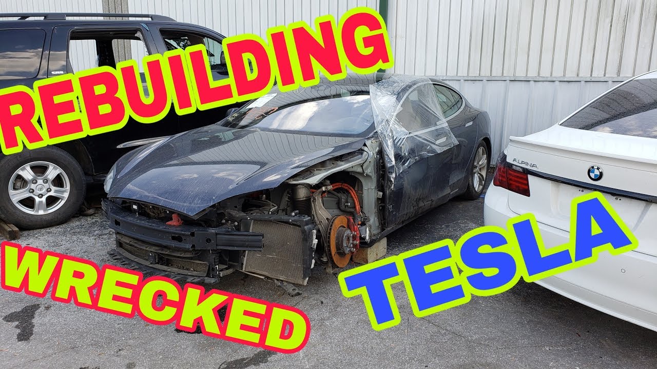 Rebuilding a Wrecked Tesla P85D bought at auction Part 1