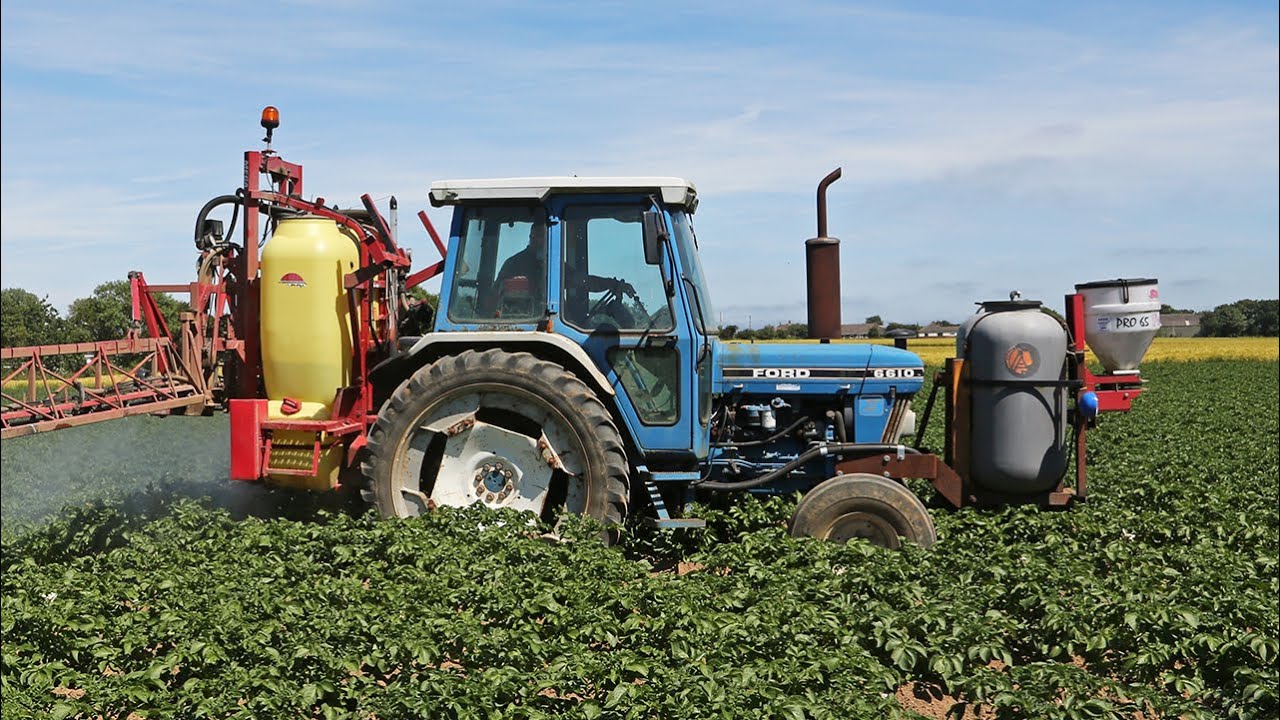Classic Ford 6610 Force II spraying potatoes with Hardi Mega 20m sprayer and Allman front tank