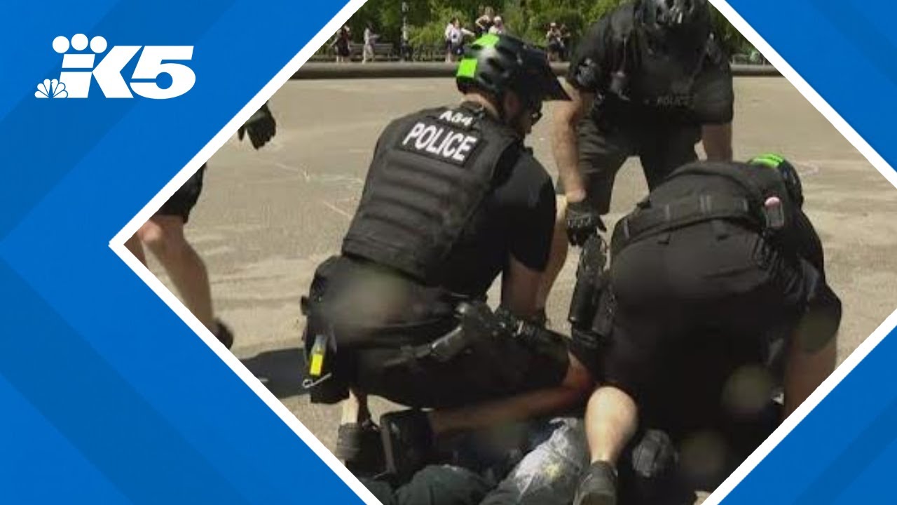 Rally and counter-protest result in arrests at Seattle's Cal Anderson Park