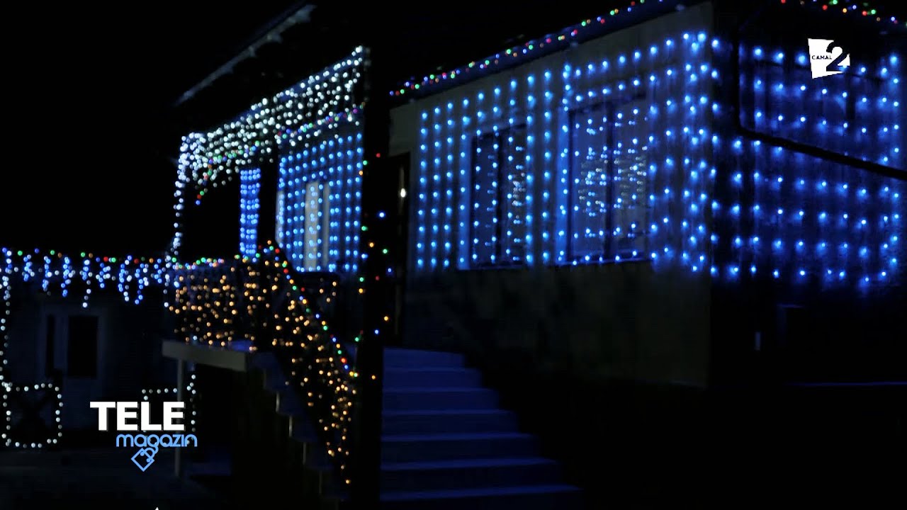 Poveste în satul Mereni. Doi soţi şi-au decorat casa cu sute de luminiţe LED
