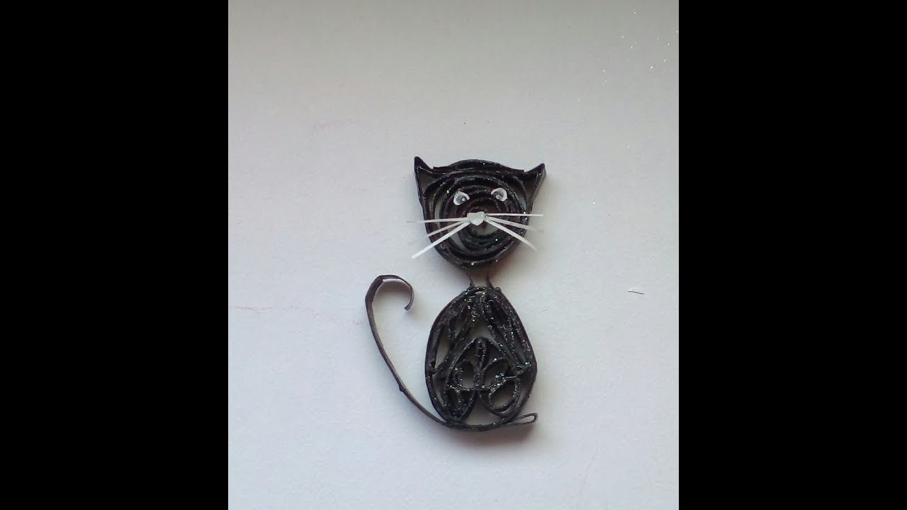 gatito hecho con tubos de papel higienico