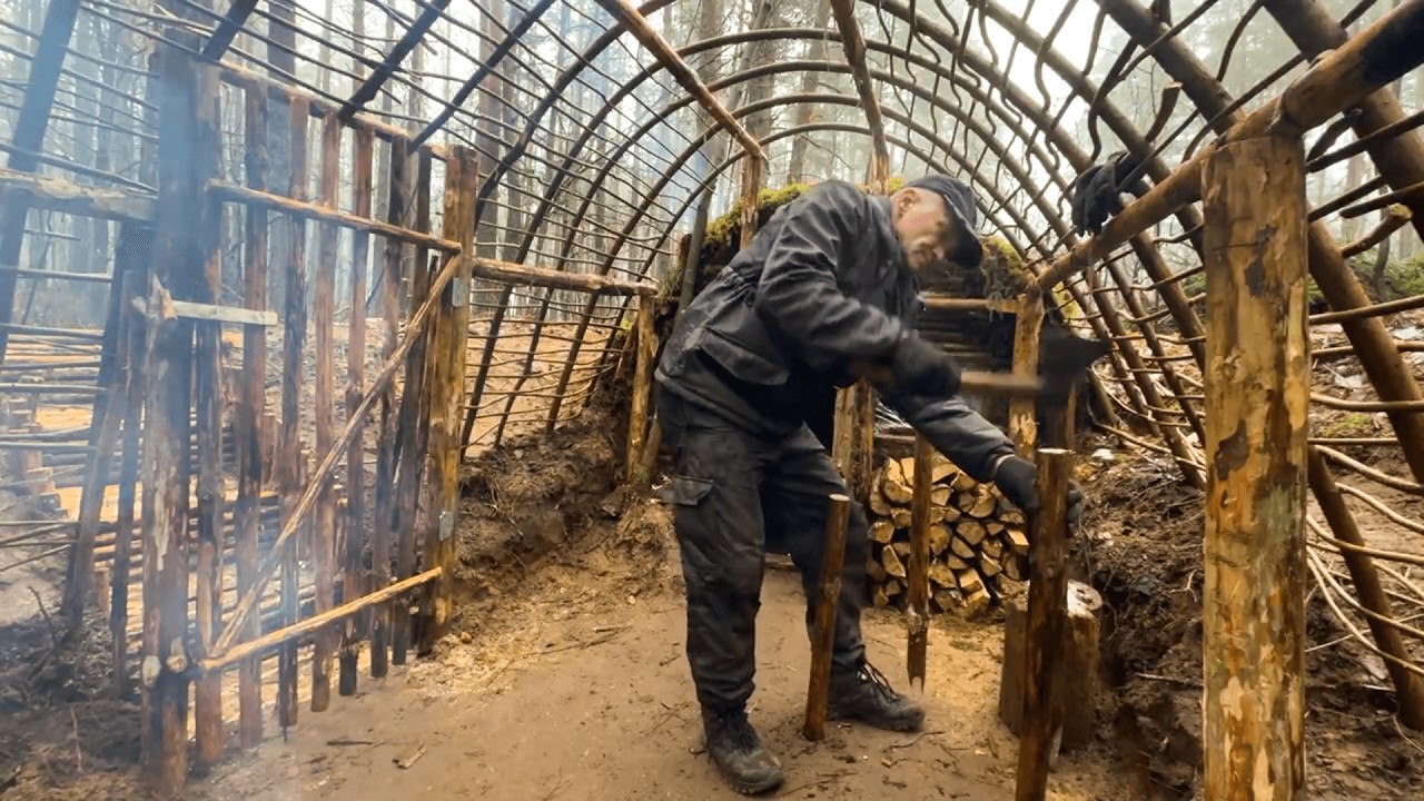 Build a shelter in the forest to avoid wild animals, cook, and spend the night