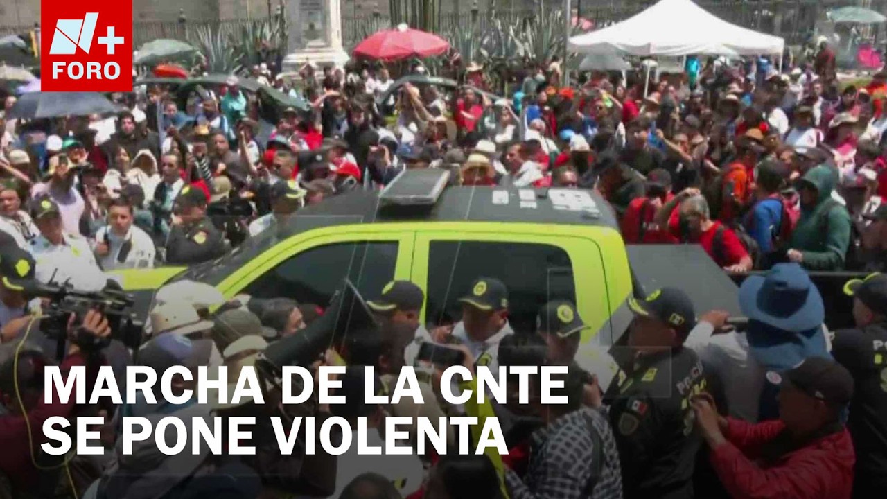 Marcha de la CNTE se enfrenta a golpes y empujones contra policías