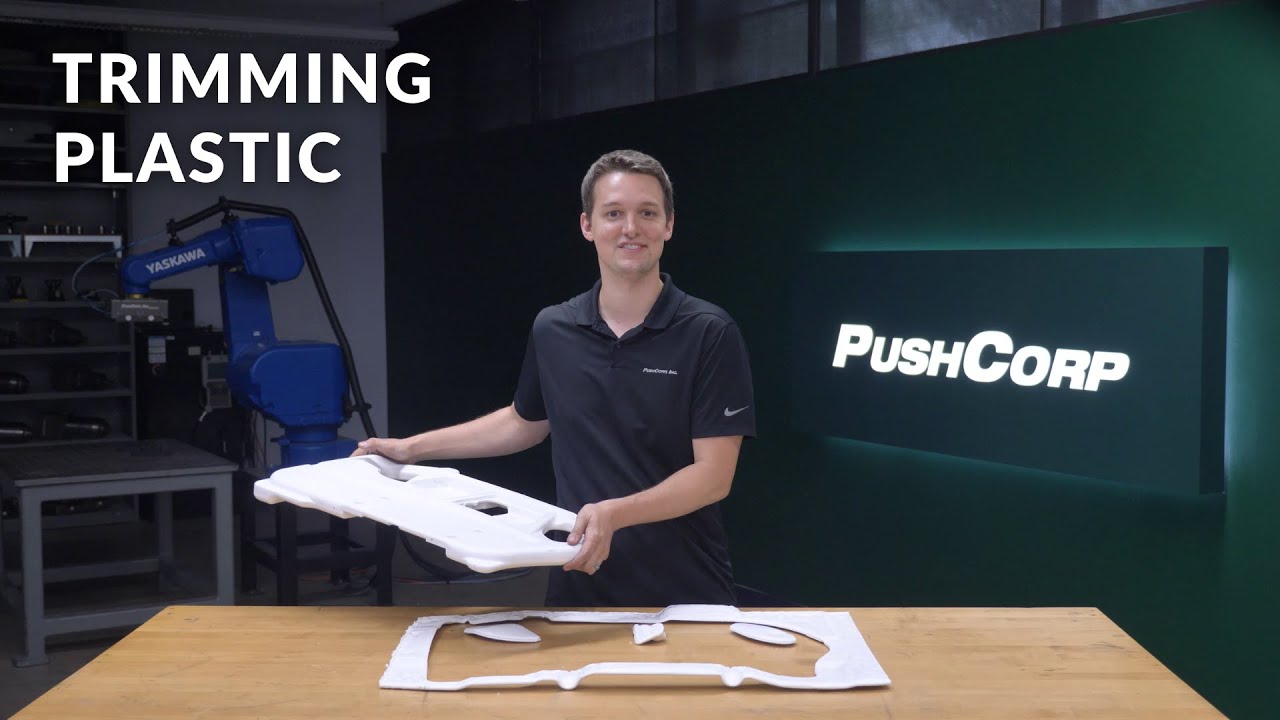Plastic Trimming and Deflashing Automation With a Force Control EOAT and an Industrial Robot