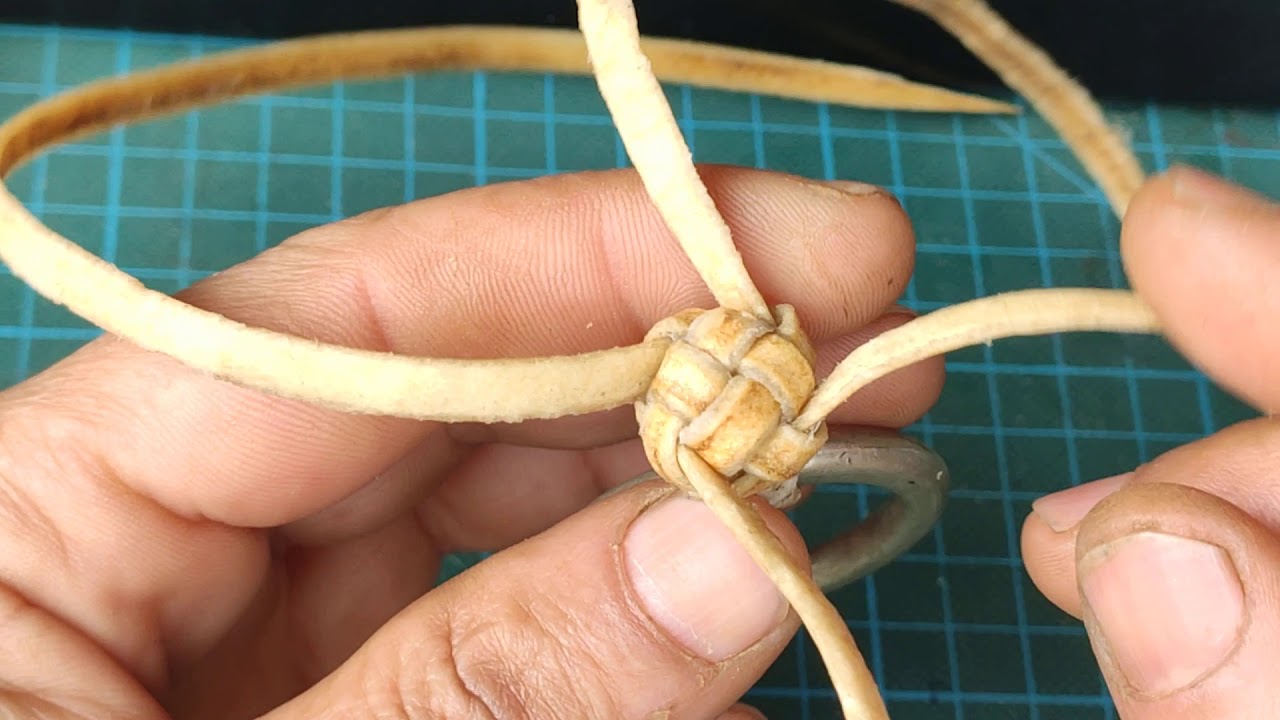 Botão pluma 4 tentos.