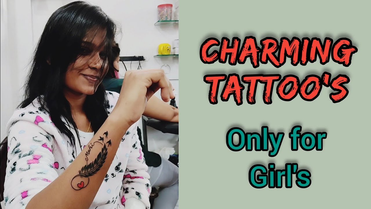 Top 10 charming tattoos |  feather tattoo for girls