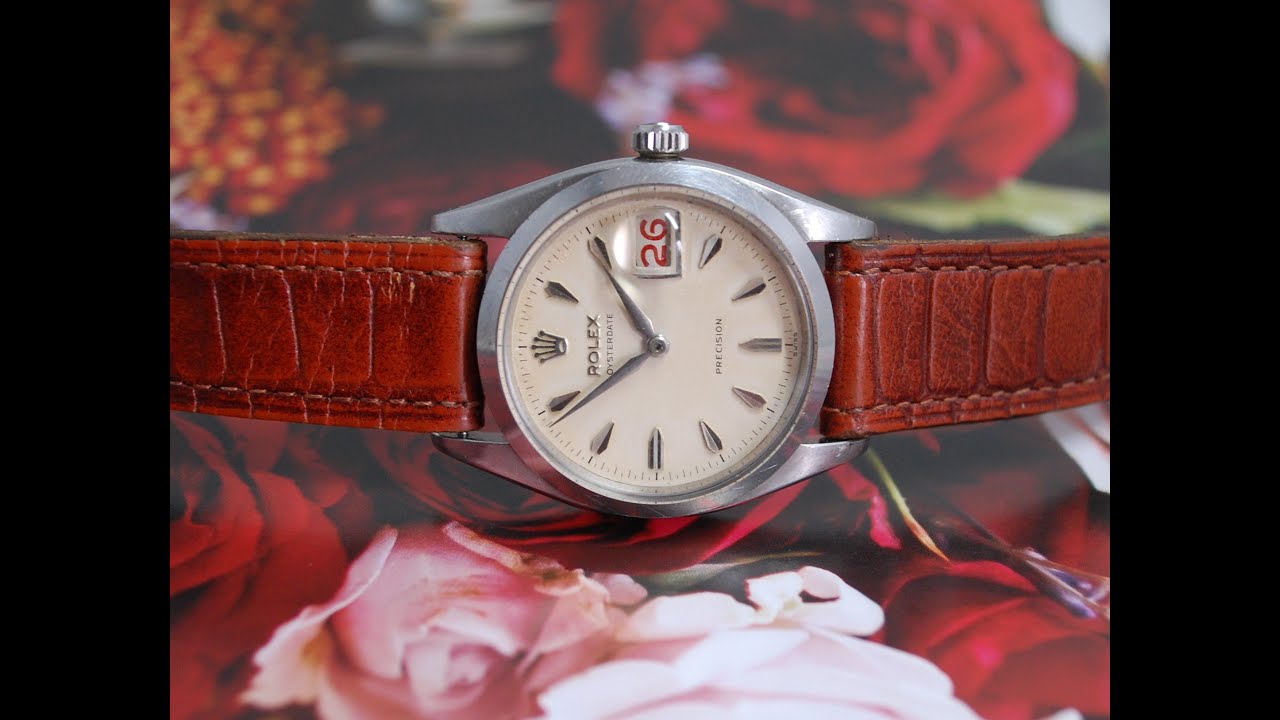 1957 Rolex Oysterdate men's vintage watch with roulette date wheel.  Model reference 6494