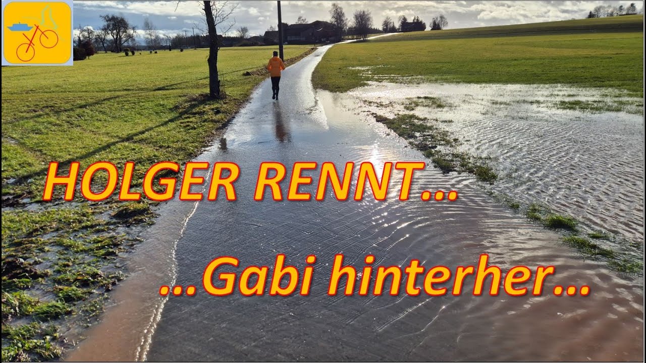 Holger rennt....Gabi hinterher, Laufrunde mit viel Wasser
