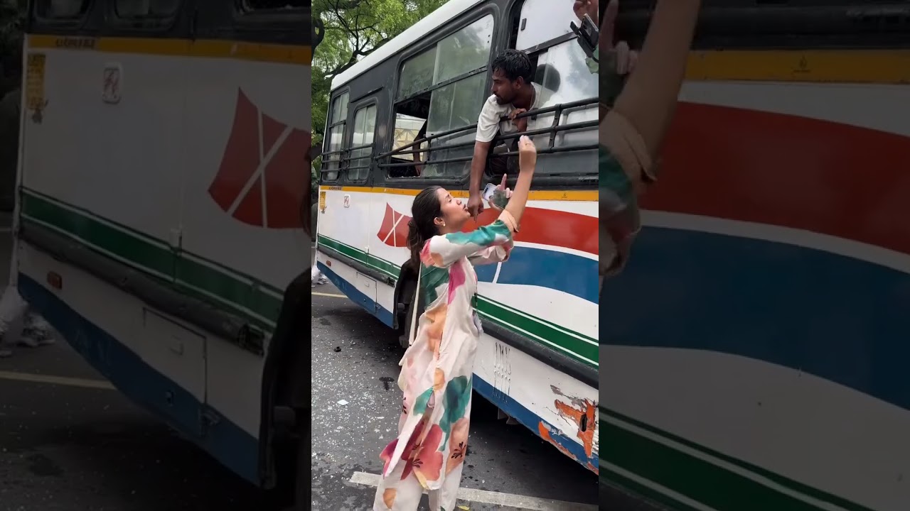 Protesters pushed into buses, some responded with violence, breaking the window of a detention bus.