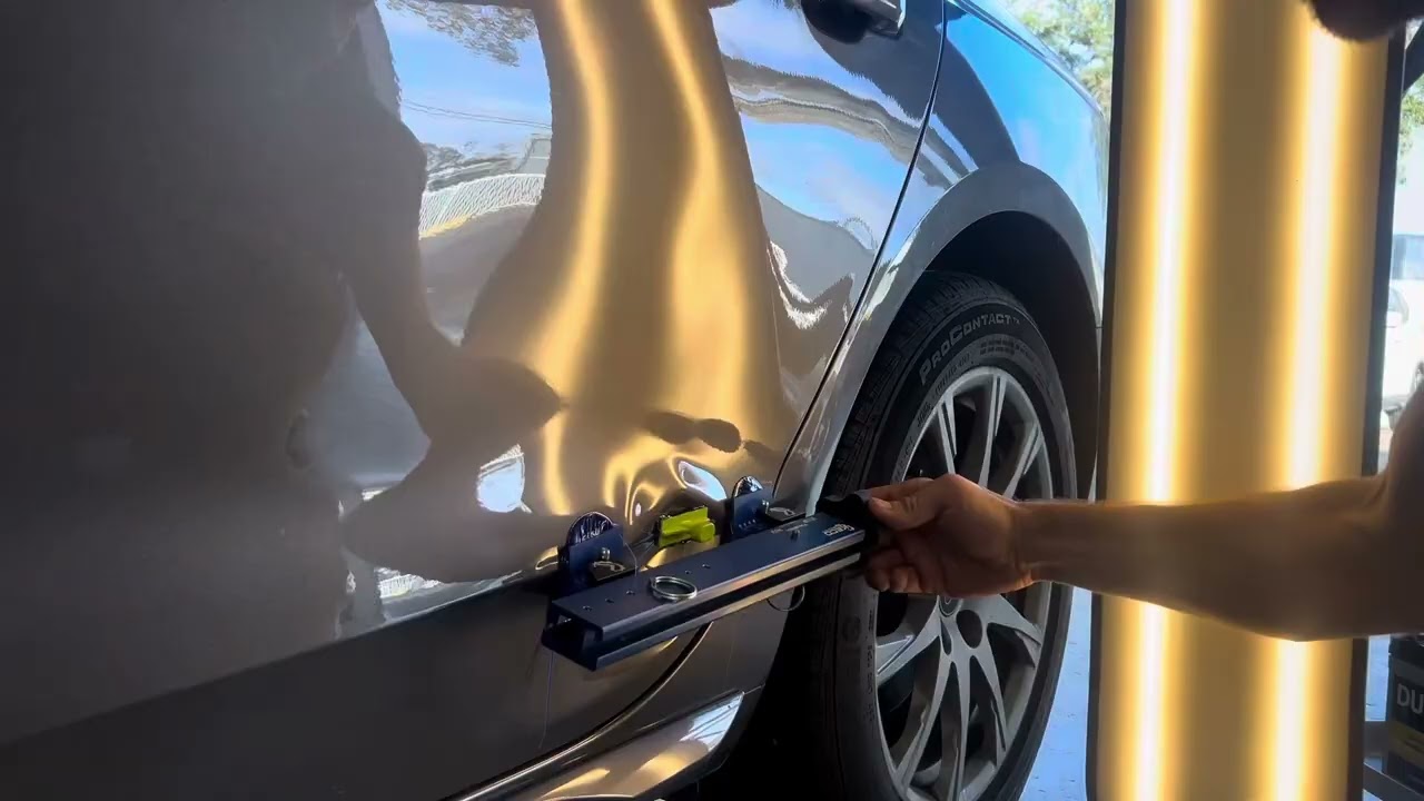 Large Dent Repair on this Audi Door in Tampa Bay