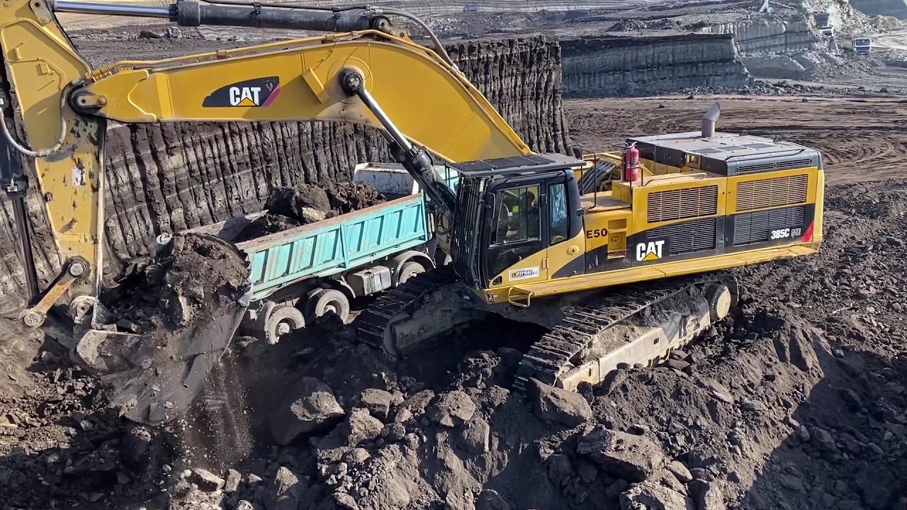 Cat 385C Hydraulic Excavator Loading Overburden On Mercedes & MAN Trucks - Interkat SA