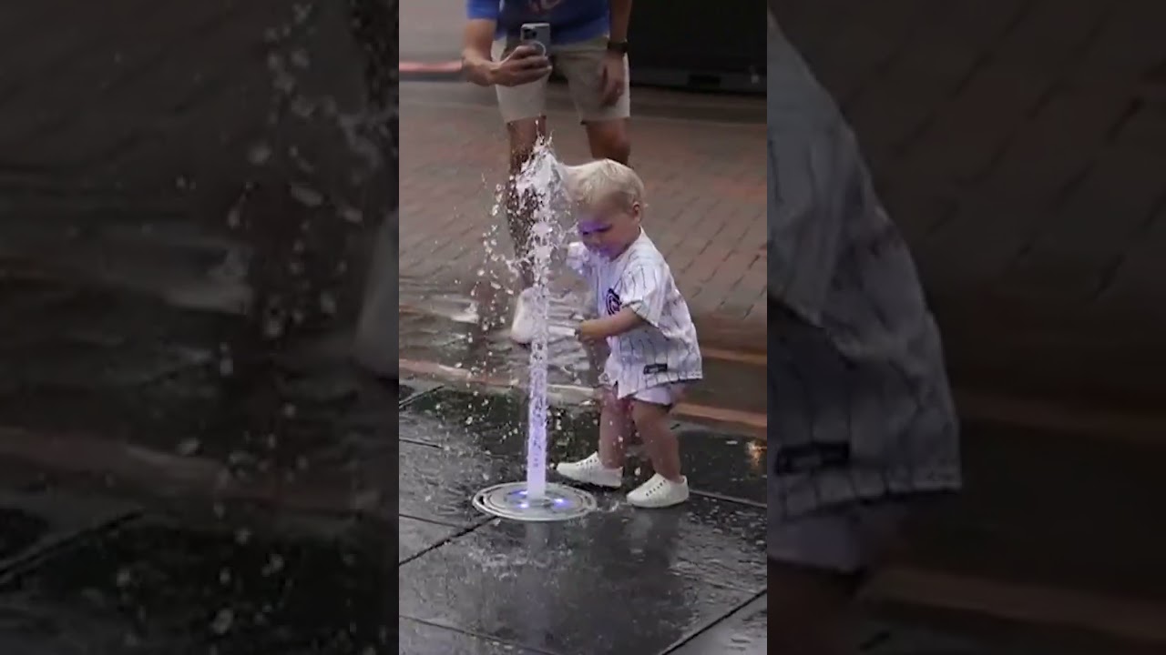 Kid vs. fountain. See who wins! 🤣