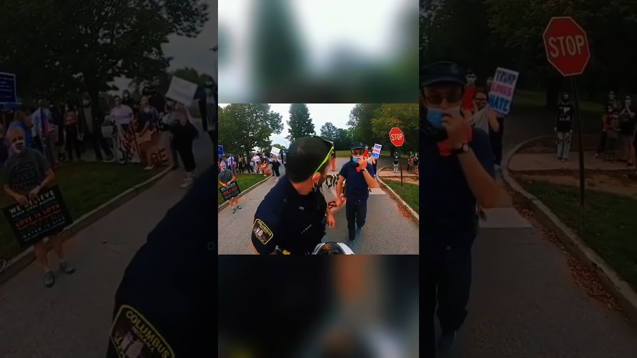 Cop breaks up protest drama with biker involved 🚨