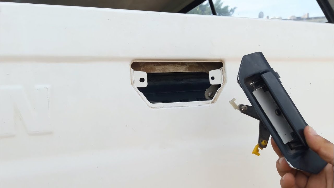CÓMO REPARAR LA MANIJA DE LA CAJA DE CARGA
