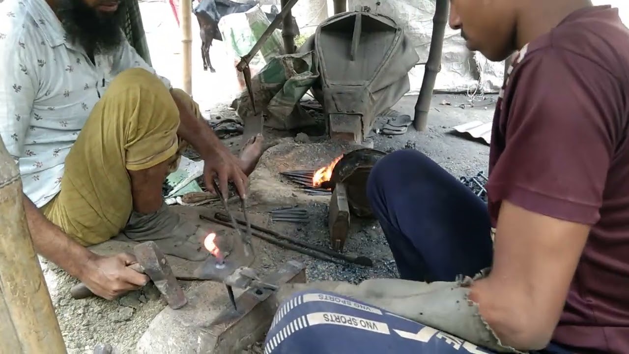 A blacksmith has to work hard to make nails by hammering iron.🔥🔨new blacksmith work 