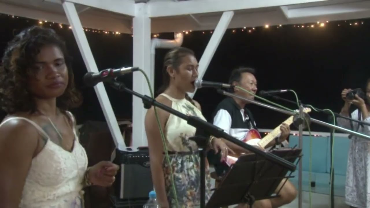 Late David Tam of PNG Rabaul, Port Moresby.  Performing with Band in Kokopo Papua New Guinea Song 2