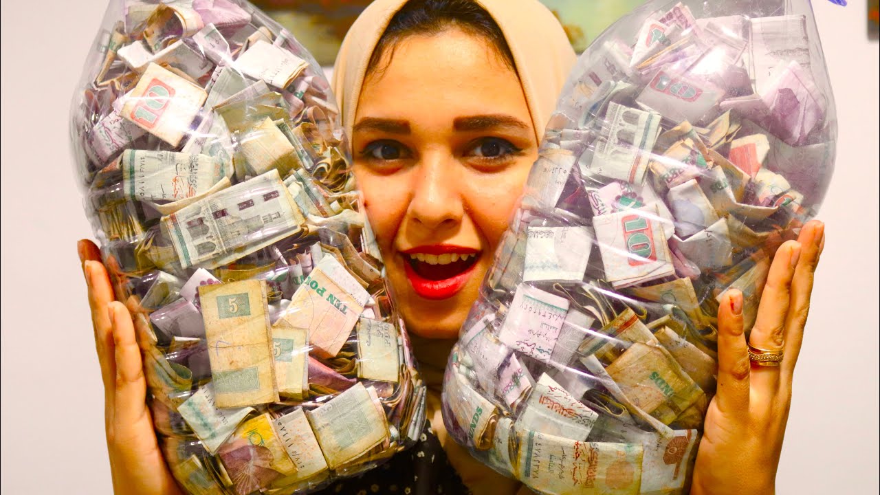 فتحنا اكبر حصالة من فلوس اليوتيوب بعد سنة