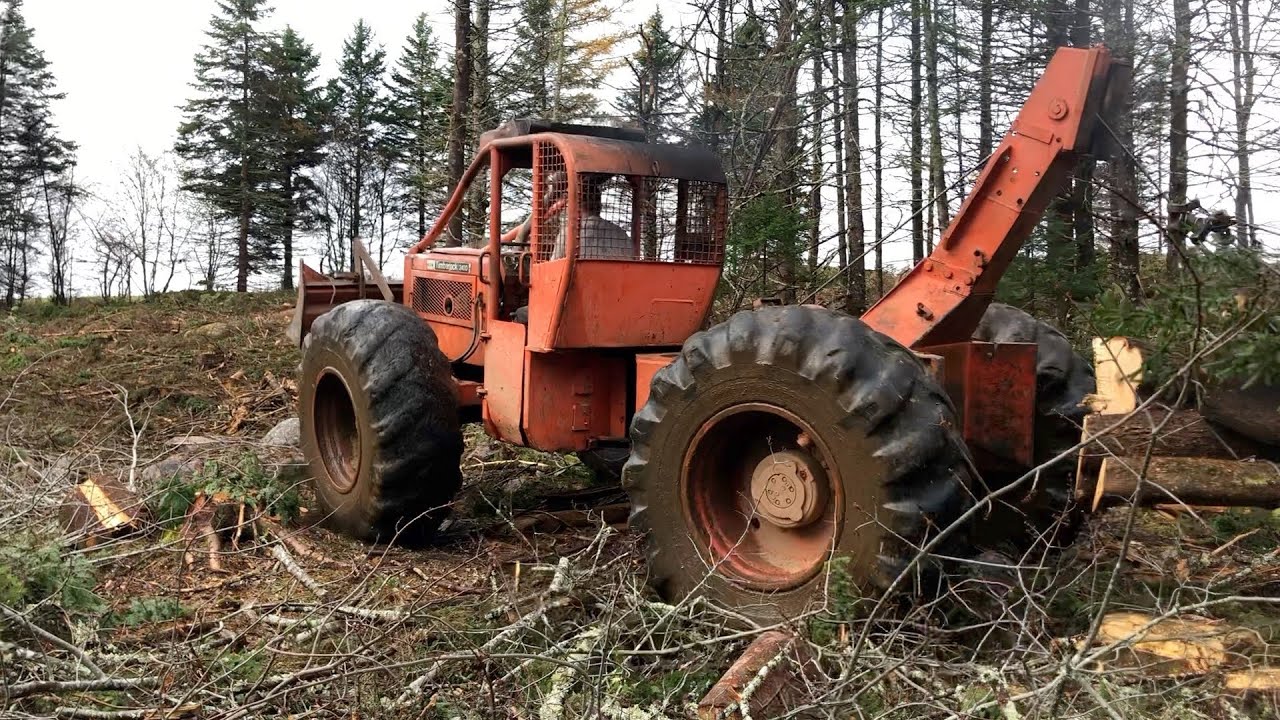 Old Forestry Equipment 240D Timberjack Skidder Just Keeps on Hauling Logs
