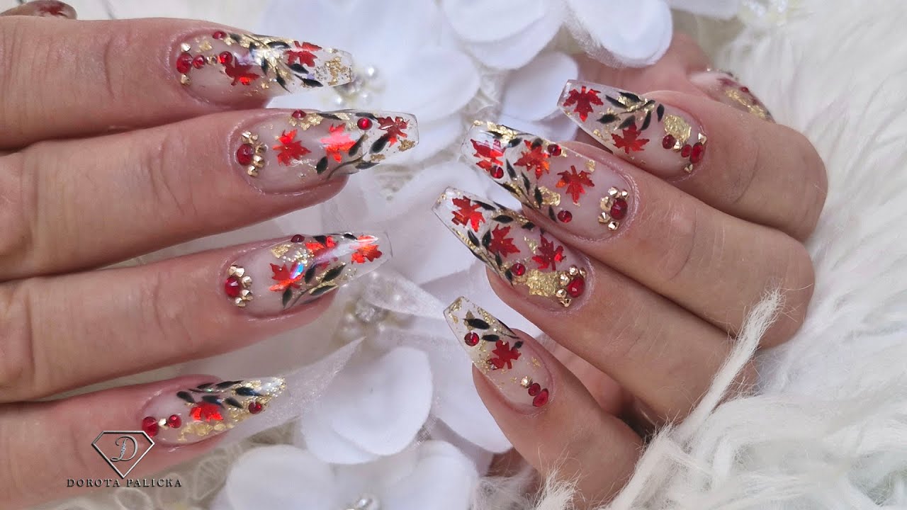 Autumn nails with encapsulated leaves and glitter made easy. Gel rebalance with clear buldier gel.