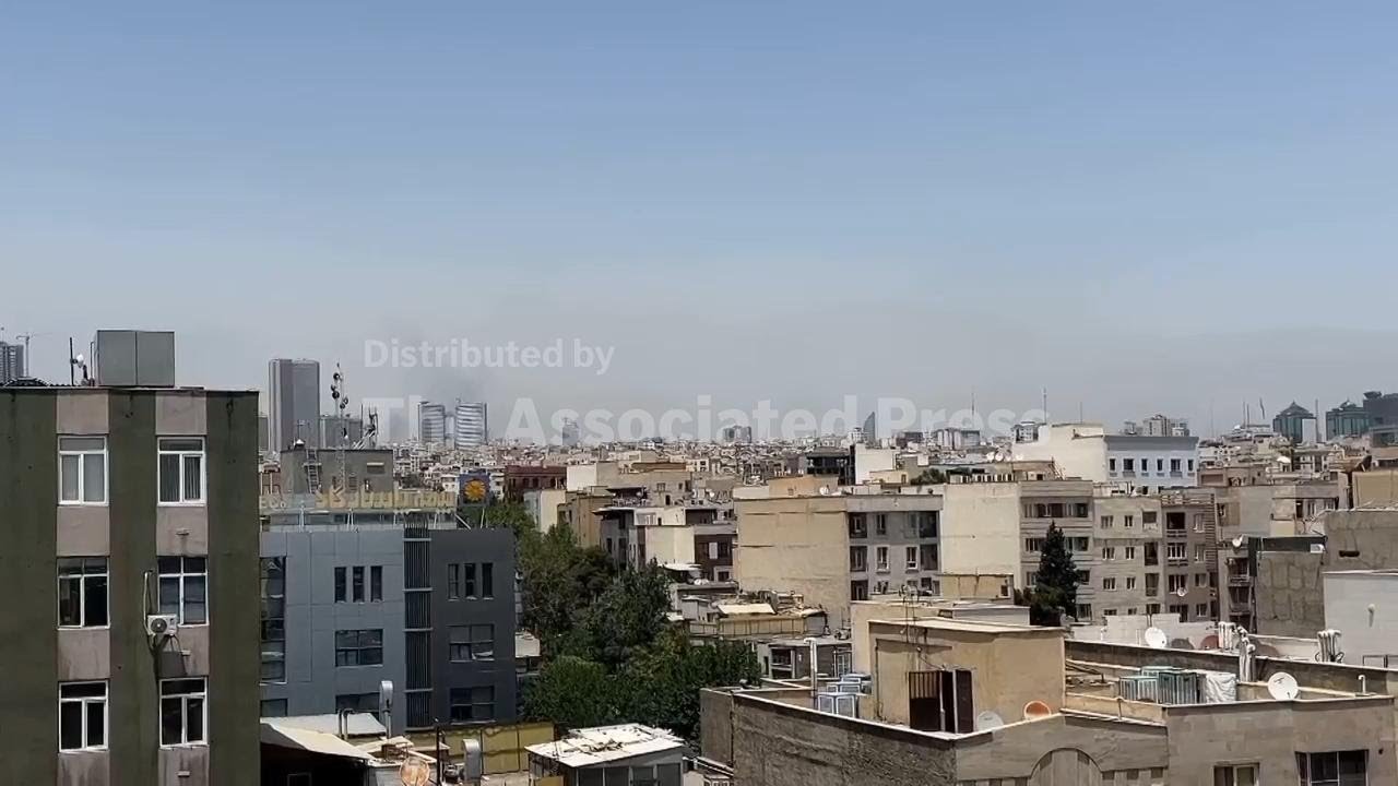 Smoke rising in northern Tehran following new strikes by Israel