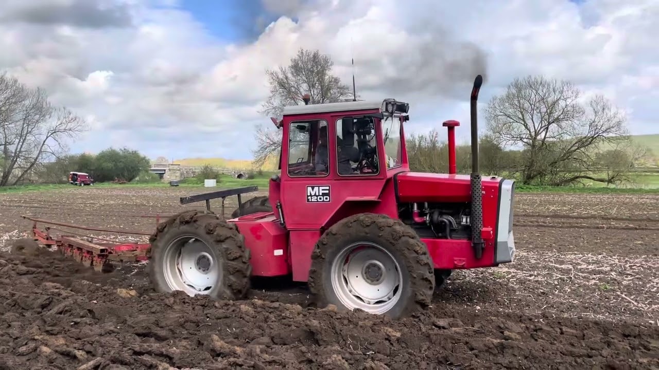 Massey 1200 ploughing