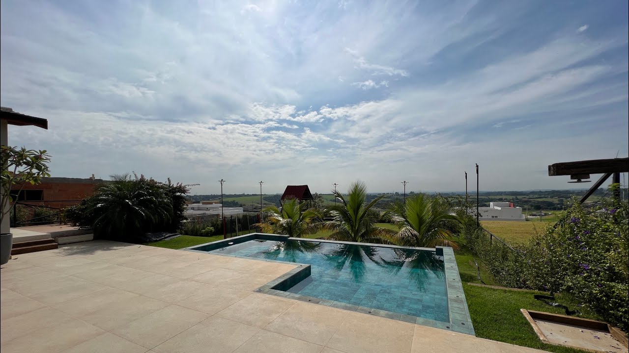 CASA A VENDA EM CONDOMÍNIO FECHADO EM INDAIATUBA 4 SUÍTES PISCINA COM VISTA TERRENO GRANDE MOBILIAD