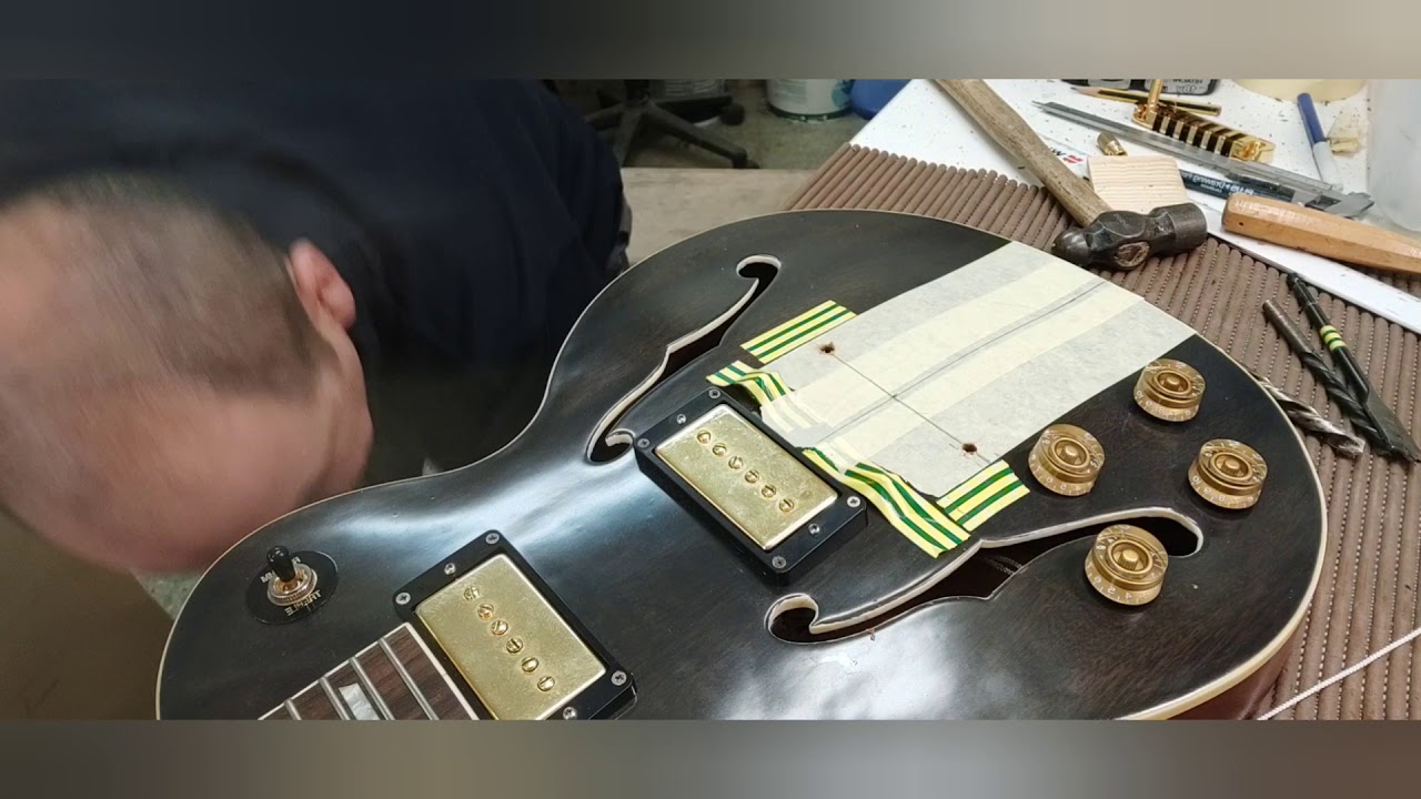 Instalar stop tail shaller.Tipo Gibson.Carpinteria f&aacute;cil. Install stoptail guitar bridge .