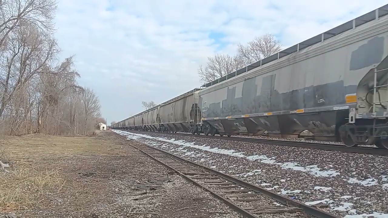 Norfolk Southern 3680 ET44AC leading grain train and south liberty missouri on Tue feb 3rd at 3:31pm