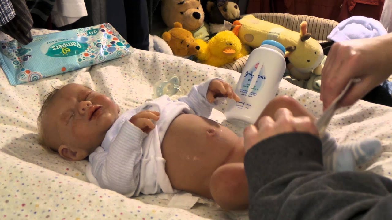 Full Body Silicone Octavian gets his first fake poopy diaper change