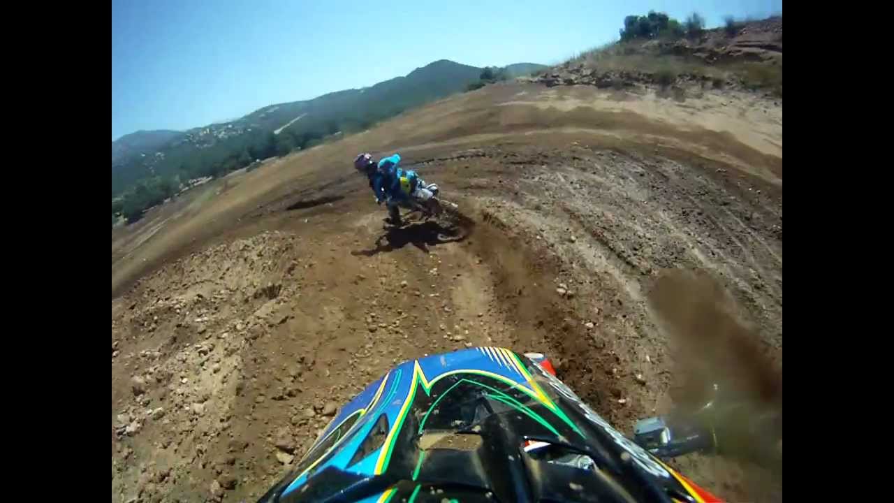 Matthew Meckes Moto 2 Schoolboy 12-15 Barona Oaks following with the GoPro is Johnny Zachary.