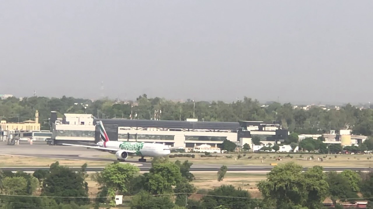 Emirates 777-300 take off view from Peshawar Airport
