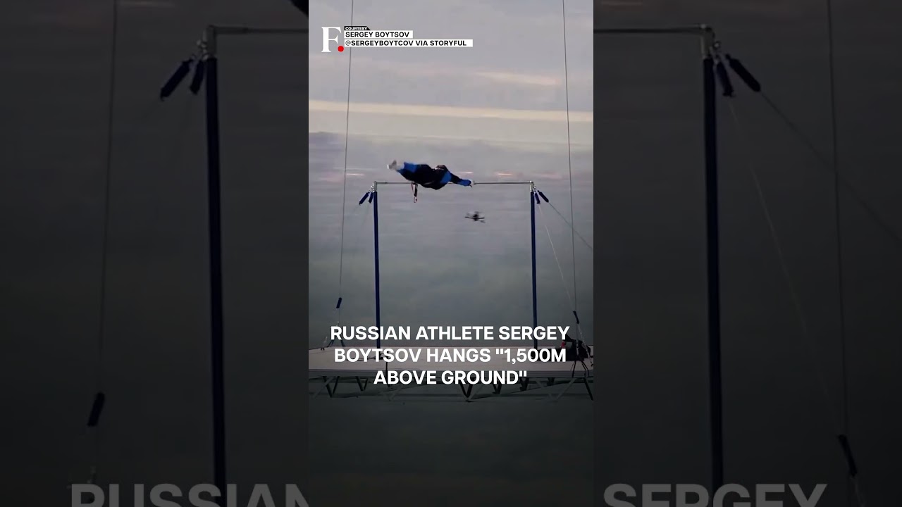 WATCH: Russian Daredevil Performs Aerial Gymnastics Under Hot-Air Balloon | N18G