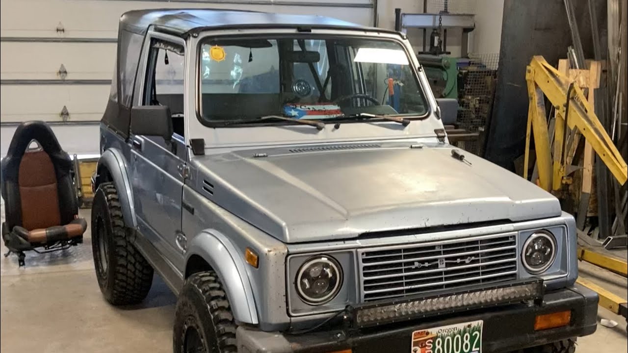 Mazda RX8 seats and a Weber carb into a Suzuki Samurai