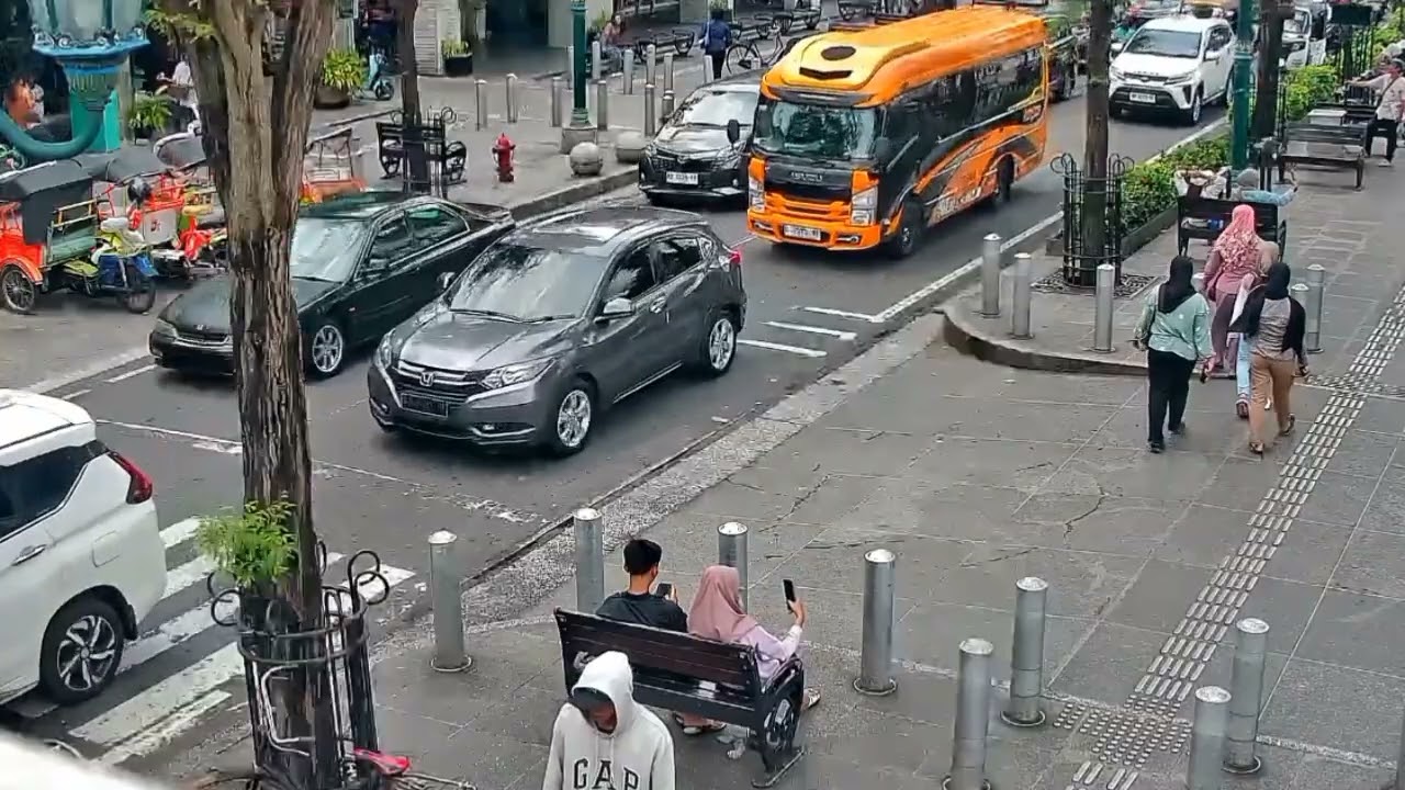 city atmosphere busy with vehicles during the day