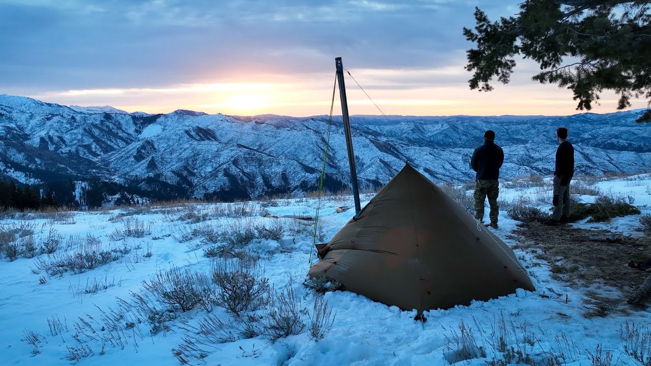 Hot Tent Winter Camping In Freezing Winds In the Rocky Mountains