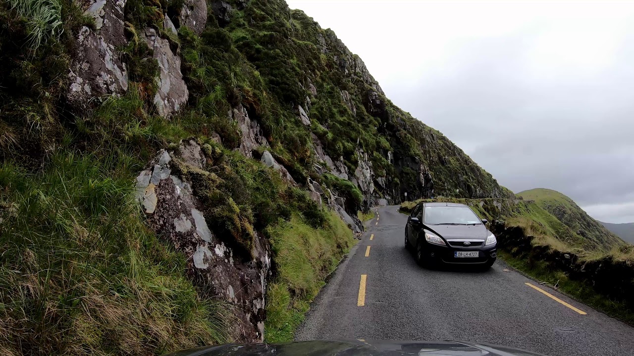 Driving the Conor Pass, Dingle, County Kerry, Ireland on a cloudy day