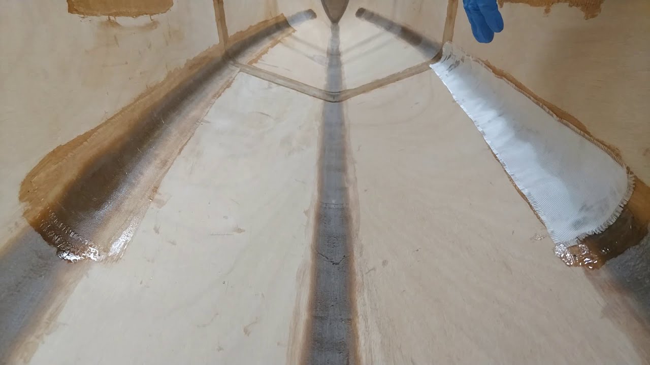 Fiberglassing a stitch and glue plywood canoe, until it becomes something else