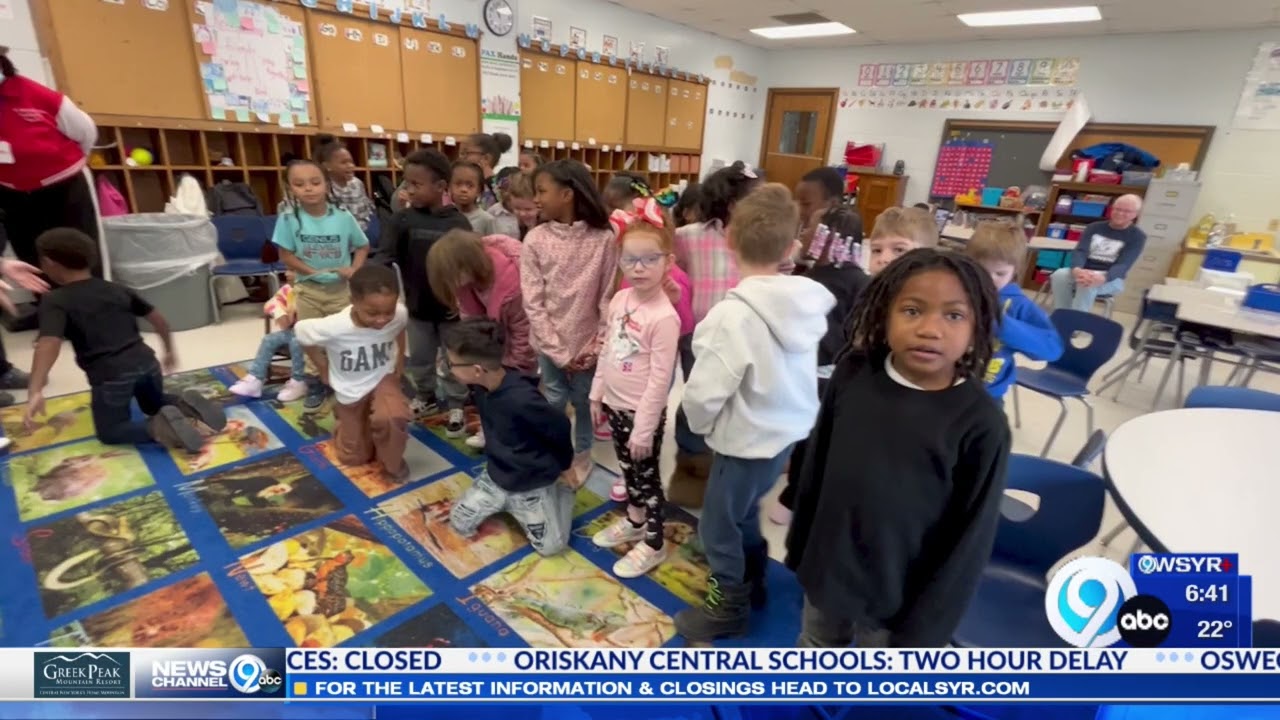 Meachem Elementary 1st graders help Kate Thornton introduce the weather