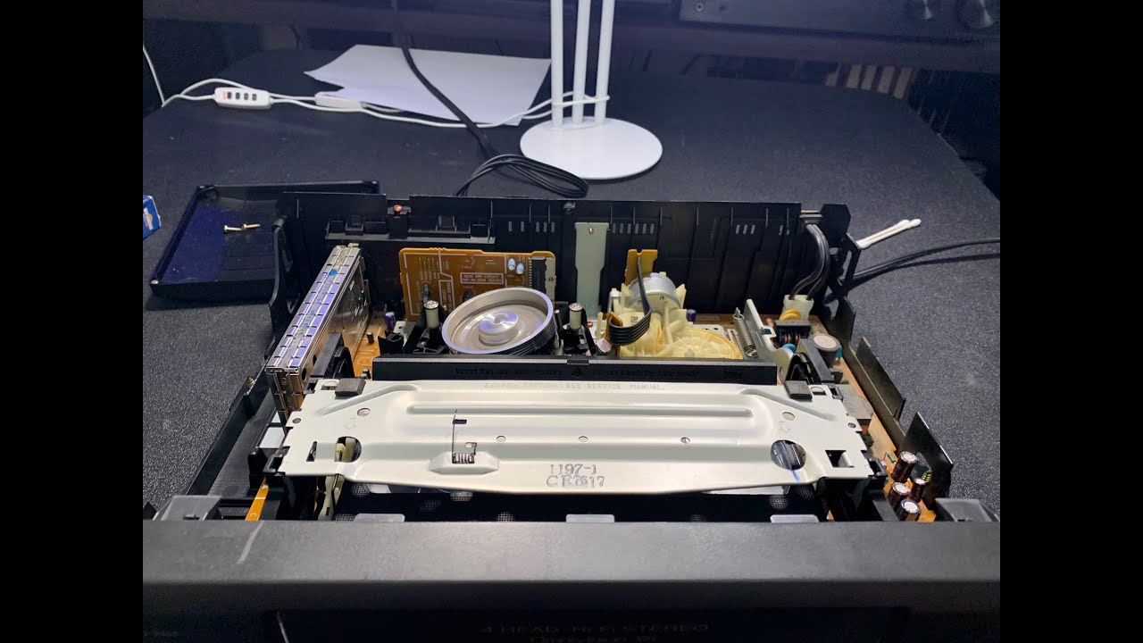 Cleaning and testing a Panasonic VCR from the thrift store.