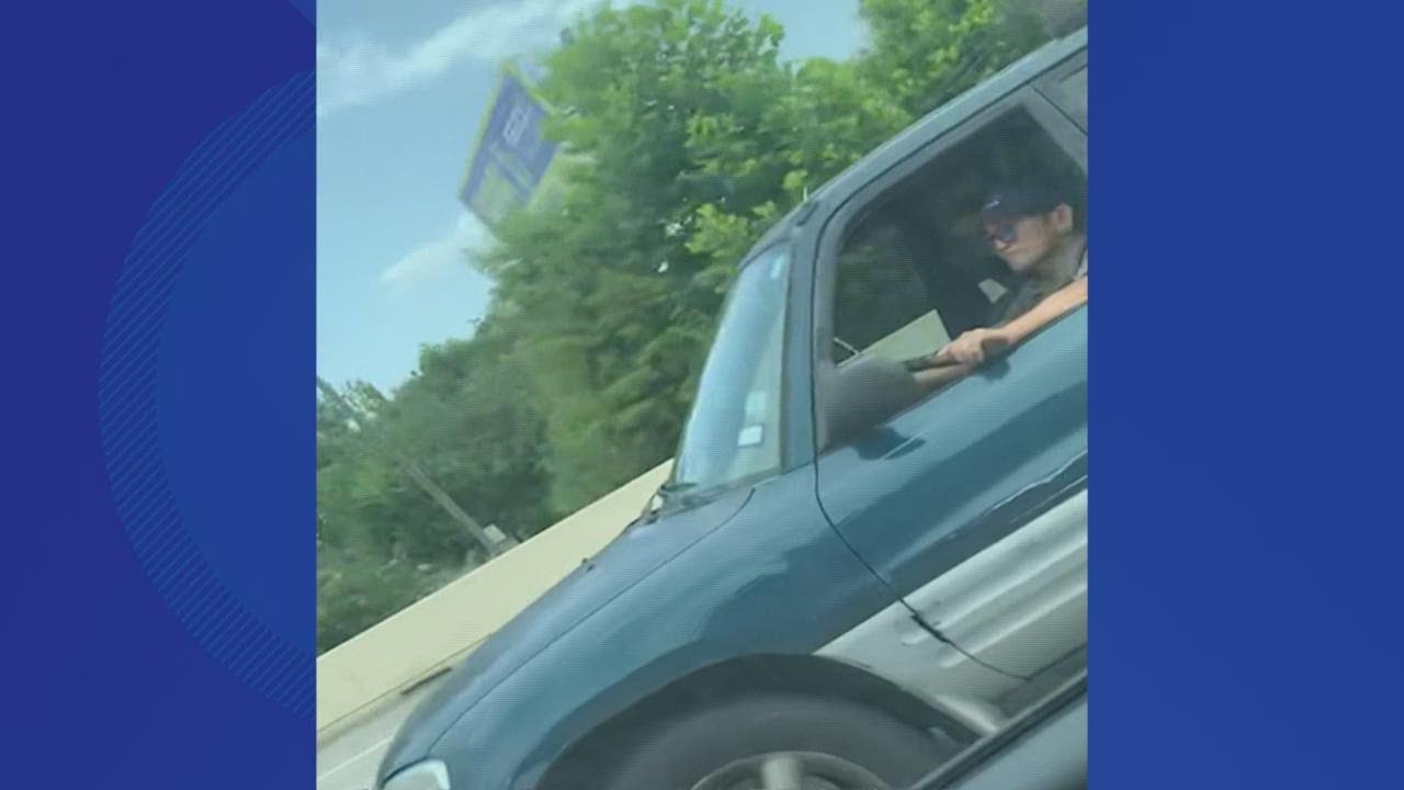Man points gun at woman while driving on the Katy Freeway, and it was all caught on camera