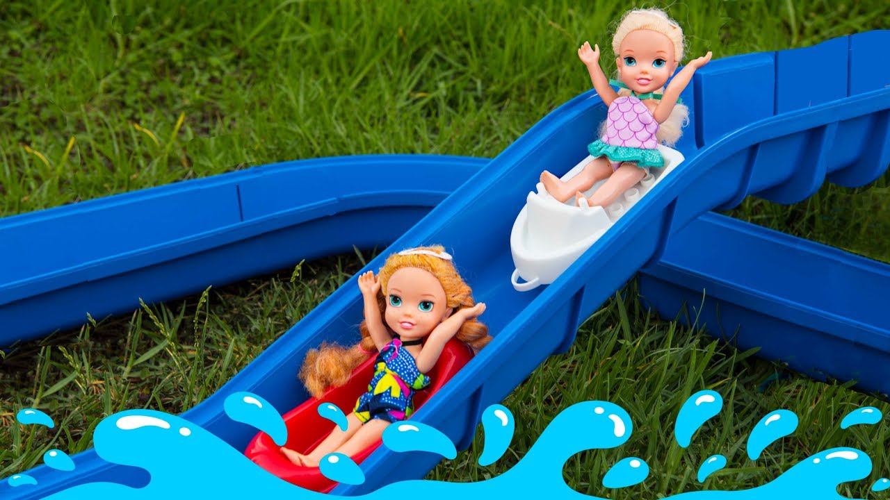Elsa and Anna toddlers fun at the water park