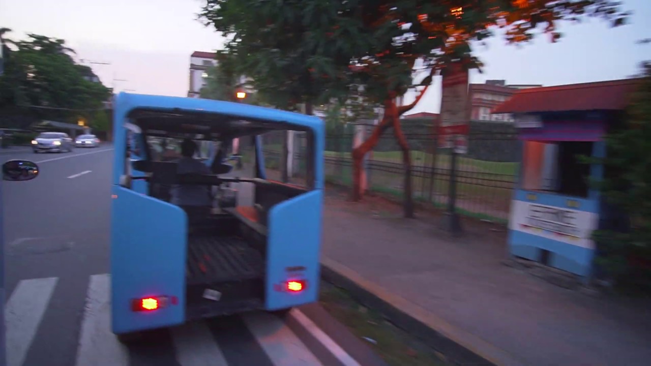 Philippines, Manila, Intramuros, electric tricycle ride