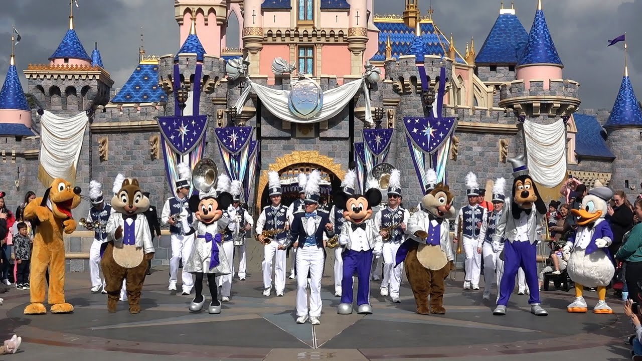 Disneyland Band w/Disney Characters in Disney100 Costumes at Sleeping Beauty Castle & Town Square